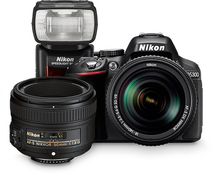 Learn how to master your photographic tools Photo of Nikon D5300 D-SLR with lens, additional lens and flash grouped together