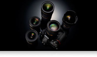 Photo of Nikon D5 surrounded by NIKKOR lenses