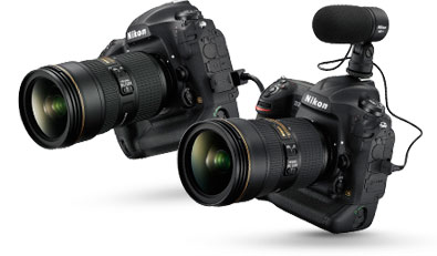 Photo of the D5 with a NIKKOR lens and ME-1 mic on the hotshoe, alongside a D5 with NIKKOR lens and Ethernet cable attached