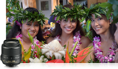 Photo of three hula girls in Hawaii and a product shot of the 18-55mm lens
