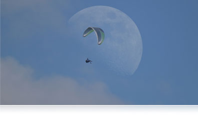 Unique images using the Multiple Exposure Mode Photo of the moon and a glider highlighting the multiple exposure mode of the P600