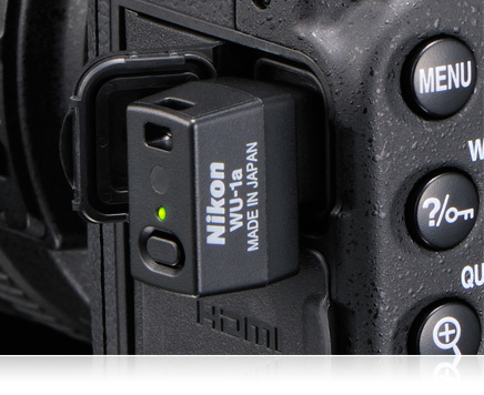 Nikon D7100 side of body close up with WU-1a wireless mobile adapter in place