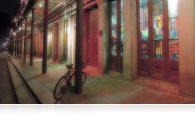 Nighttime Backlight HDR photo of storefronts on a New Orleans, Louisiana street