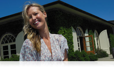 Portrait of a young woman demonstrating the COOLPIX S6300's Smart Portrait System.