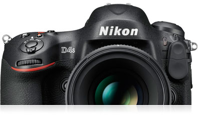 Photo of the top half of the D4S with a NIKKOR lens attached