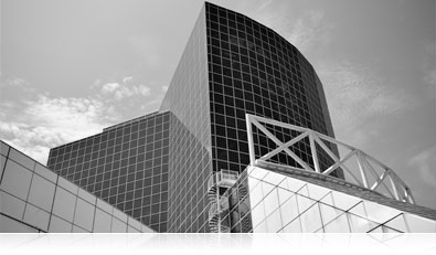 Black and white photo of buildings against the sky