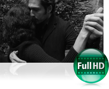 Record Full HD videos with the Nikon COOLPIX P330 black and white photo of a man and woman dancing with the Full HD graphic icon inset