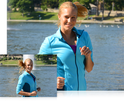 photos of a woman wearing a blue warm-up jacket, near a pond