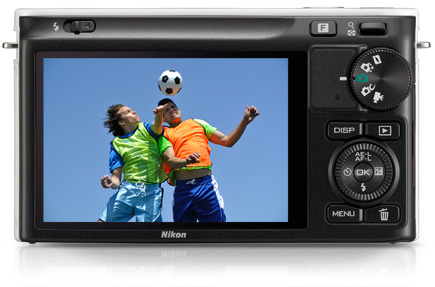 Rear of the Nikon 1 J2 showing its 3-inch LCD and soccer players on the screen