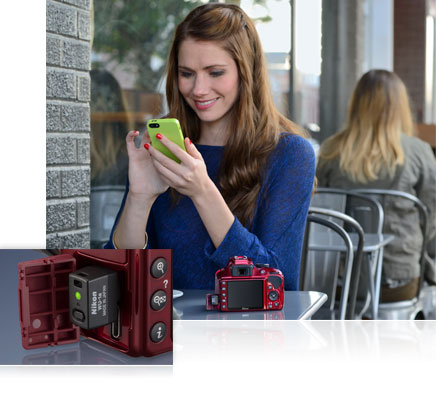 Nikon D3300 photo of a woman at an outdoor cafe with her smartphone and D3300 with WU-1a