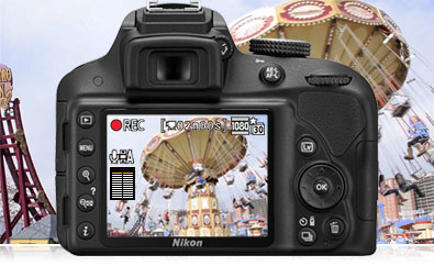 Photo of the rear of the D3300 with a scene from an amusement park on the LCD showing video recording