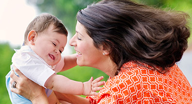 Learn how to capture life's precious moments Tamara Lackey photo of a mom holding a baby