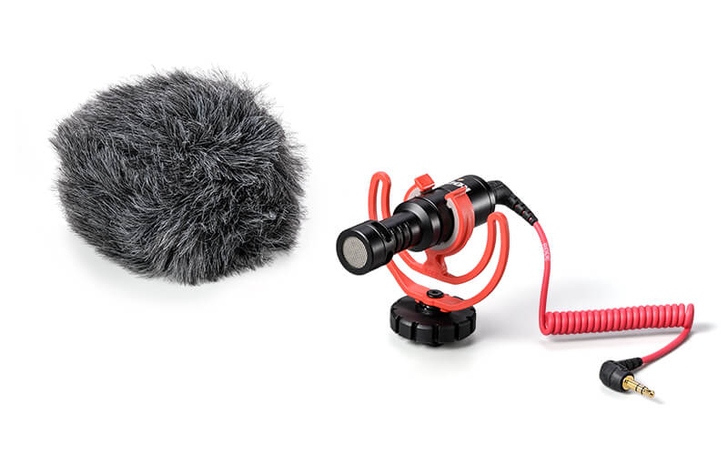 Photo of the RØDE VideoMicro microphone and the wind muff for the mic
