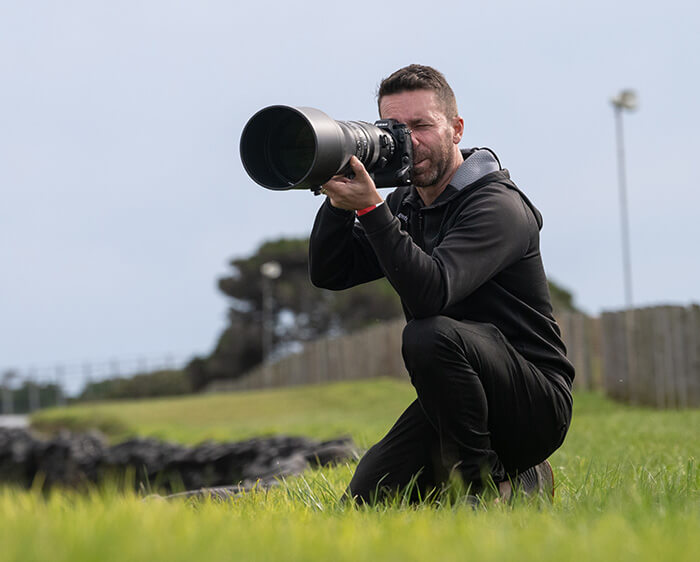 photo of a photographer shooting with the NIKKOR Z 600mm f/4 TC VR S