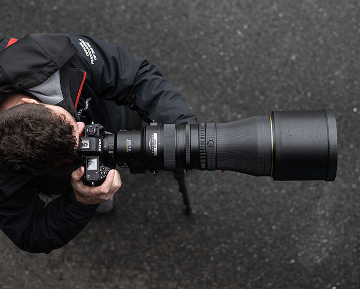 photo of a photographer shooting with the NIKKOR Z 600mm f/4 TC VR S, from overhead