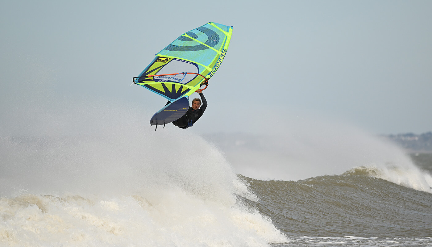 Photo of a man windsurfing, taken with the NIKKOR Z 400mm f/4.5 VR S lens