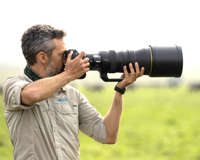 photo of a man shooting with the NIKKOR Z 400mm f/2.8 TC VR S lens