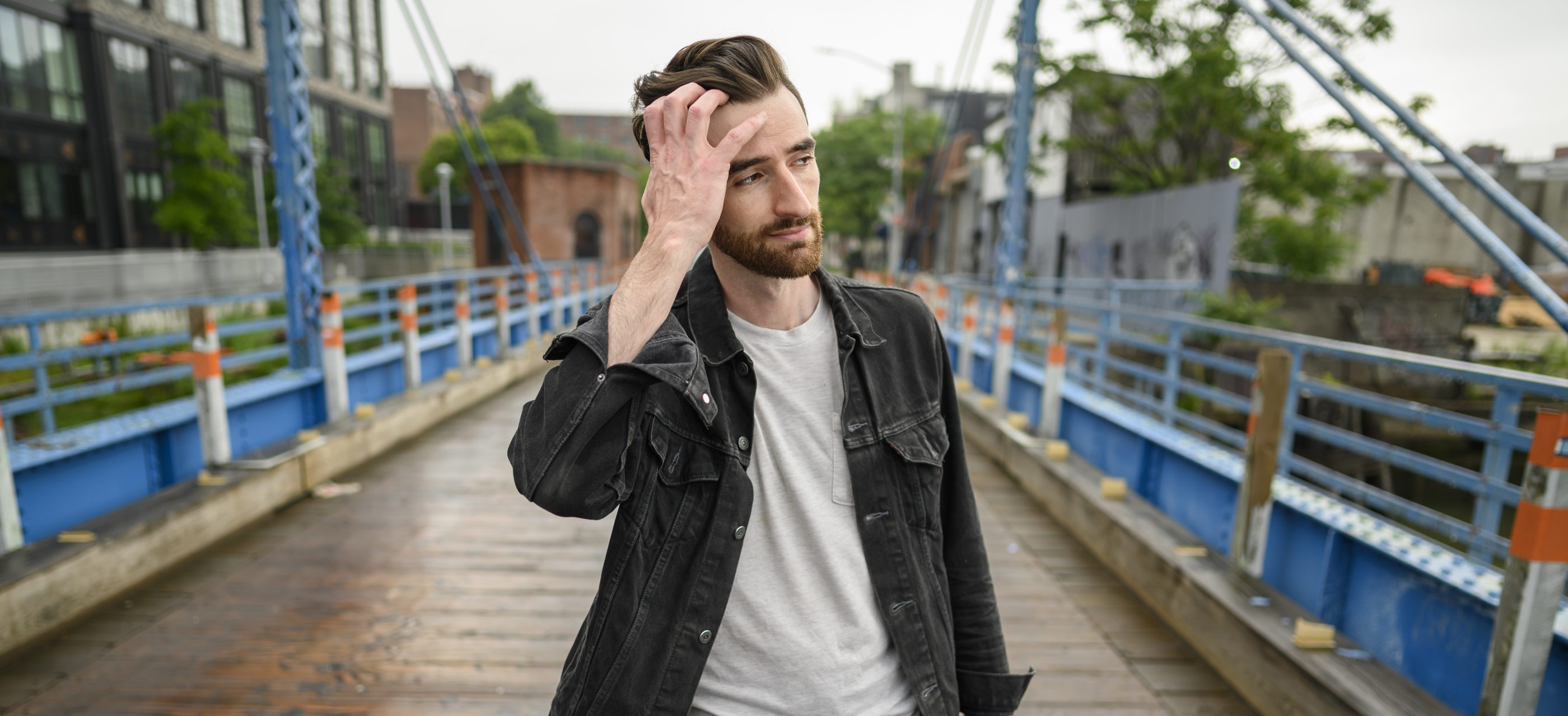 NIKKOR Z 24mm f/1.8 S image of a man on a bridge