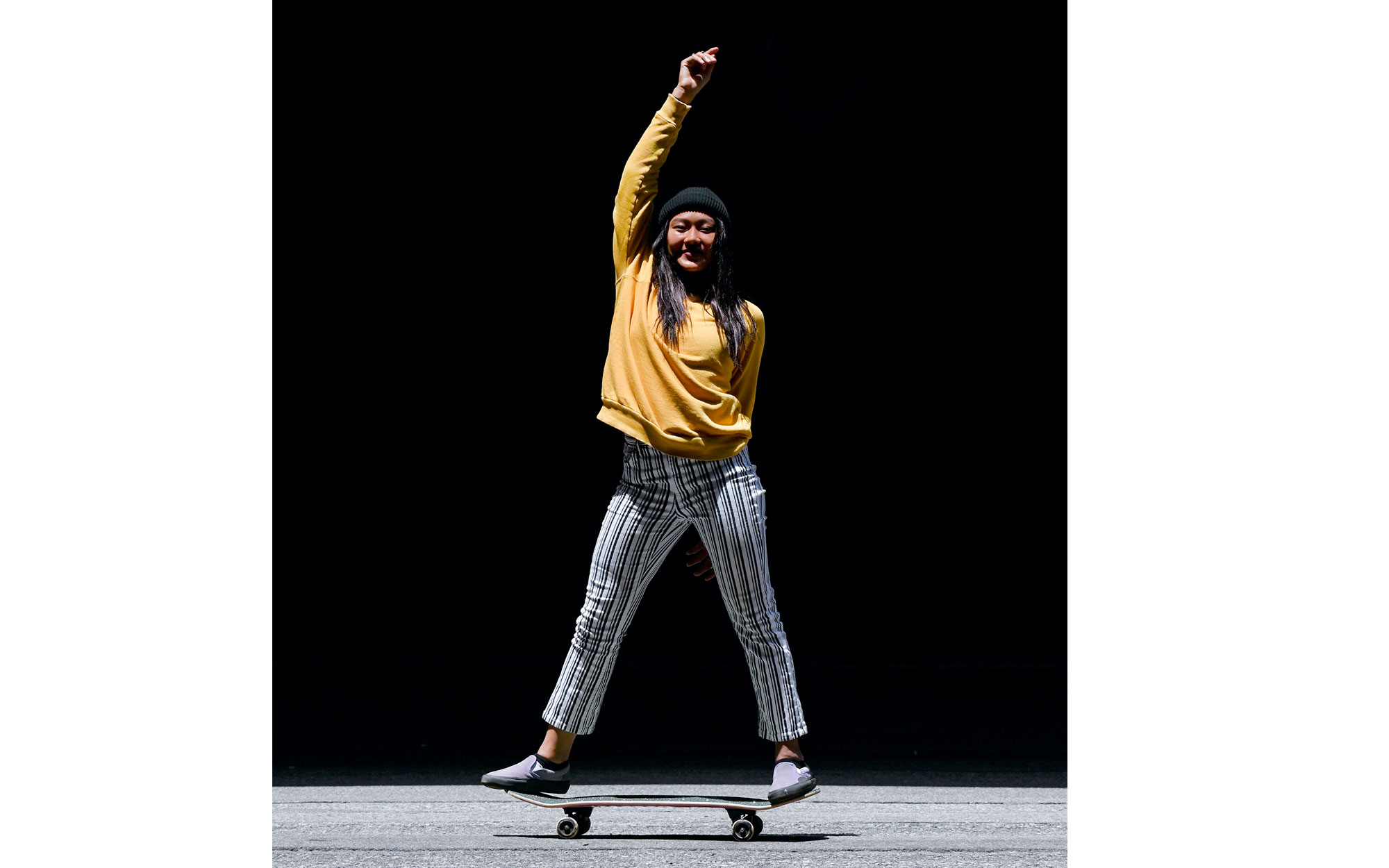 Z 50 and NIKKOR Z DX 50-250mm f/4.5-6.3 VR photo of a woman on a skateboard