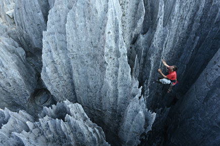 photo of a man climbing a rock-face, taken with the Z 7 and NIKKOR Z 24-70mm f/4 S lens