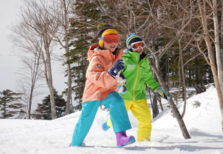 Photo of two kids in the snow shot with the W300