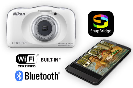 Photo of the white COOLPIX W150 and a smartphone and SnapBridge logo