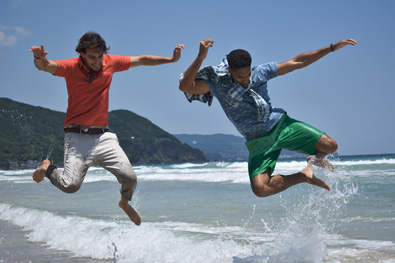 D3400 Photo Of Two Guys Jumping Over Waves In The Ocean