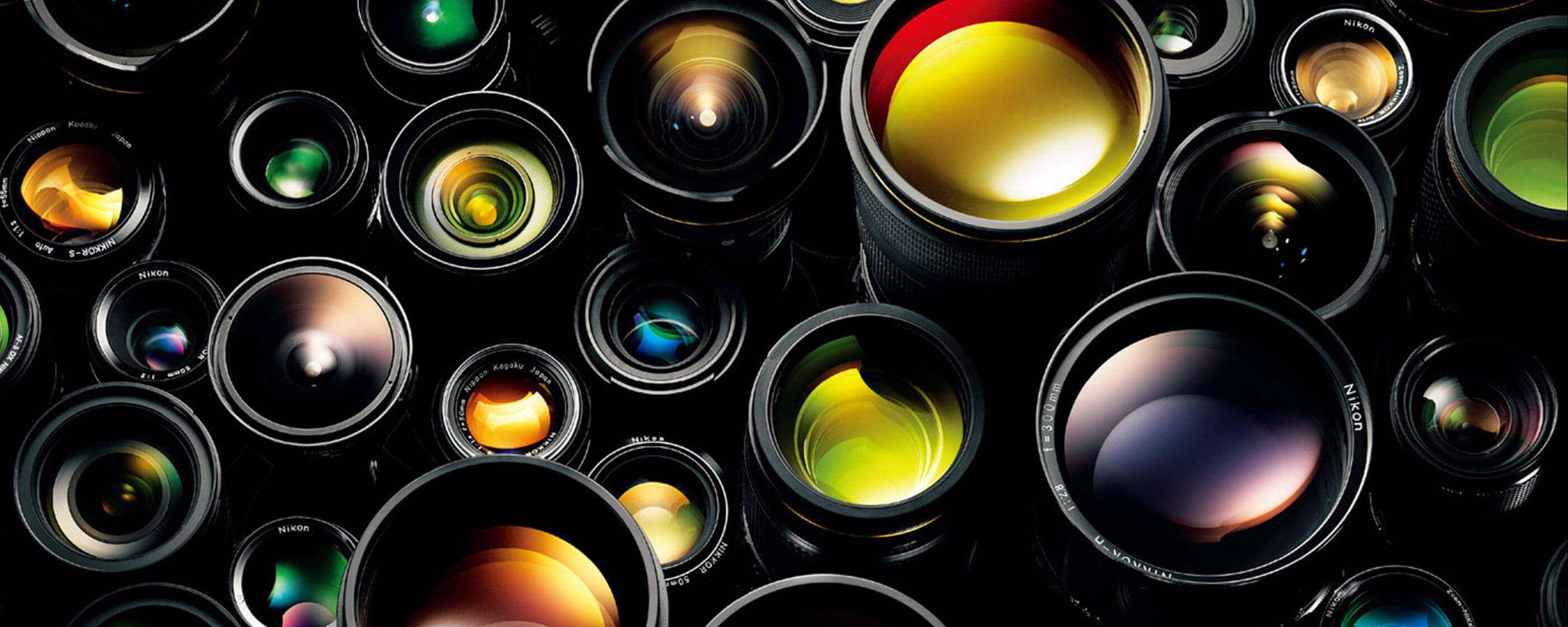 Photo showing dozens of NIKKOR lenses