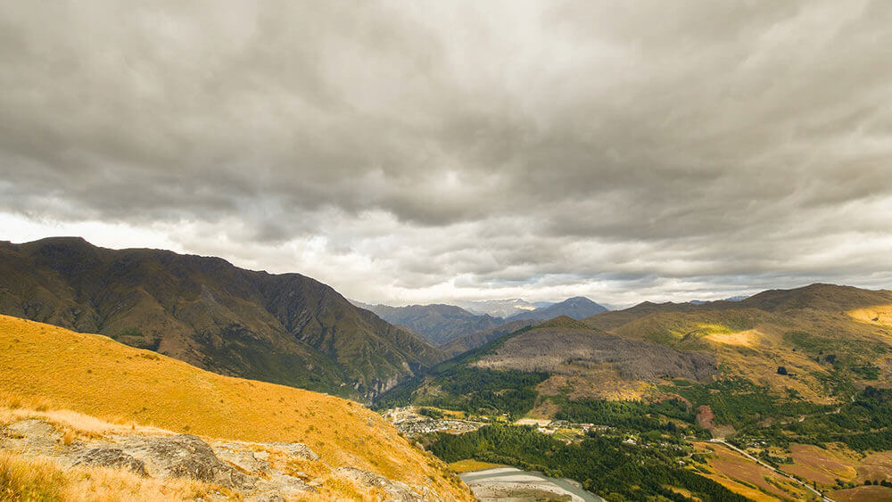 D7500 photo of a landscape with dark clouds in the sky