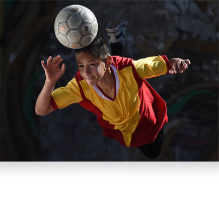 D7200 photo of a soccer player hitting a soccer ball with his head