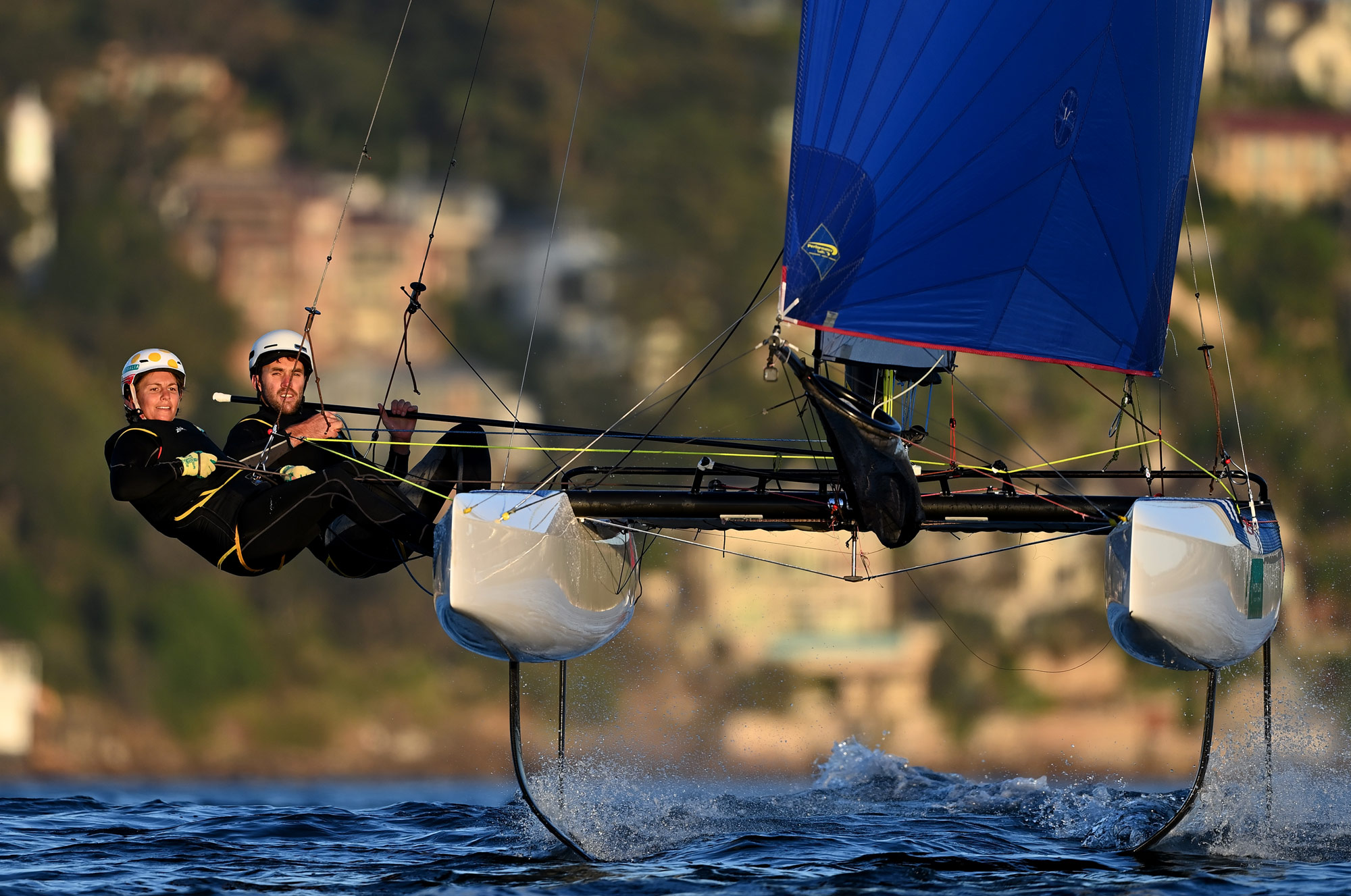 Photo of two poeple on a catamaran boat, taken with the D6 DSLR