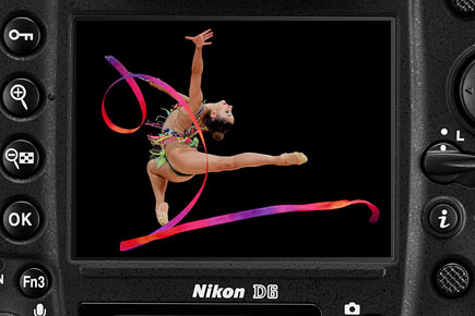 Photo of the rear of the D6 DSLR with a shot of a rhythmic gymnast on the LCD, taken with the D6 DSLR