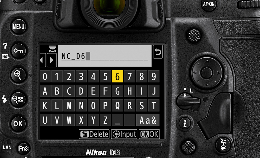 photo of the back of the D6 DSLR with the LCD showing IPTC metadata editing screen