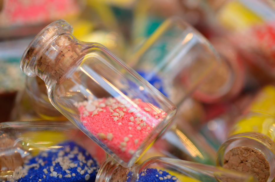 Photo of small bottles filled with colorful sand shot with the AF-S DX Micro NIKKOR 40mm f/2.8G lens