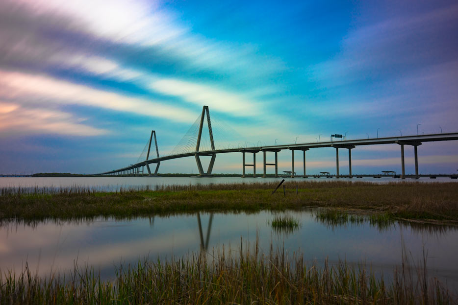 Photo of a bridge and its reflection in the water of a marsh, shot in low light with the AF-S NIKKOR 16-35mm f/4G ED VR lens