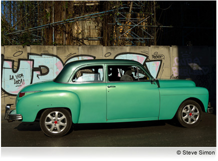 Photo of an old green car taken with the AF-S NIKKOR 24-85mm f/3.5-4.5G ED VR lens.