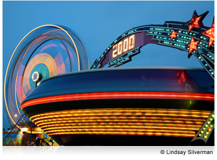 Photo of a carnival ride in motion at night, taken with the AF-S NIKKOR 24-85mm f/3.5-4.5G ED VR lens.