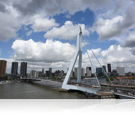 AF-S NIKKOR 24mm f/1.8G ED photo of a cityscape and bridge over a river